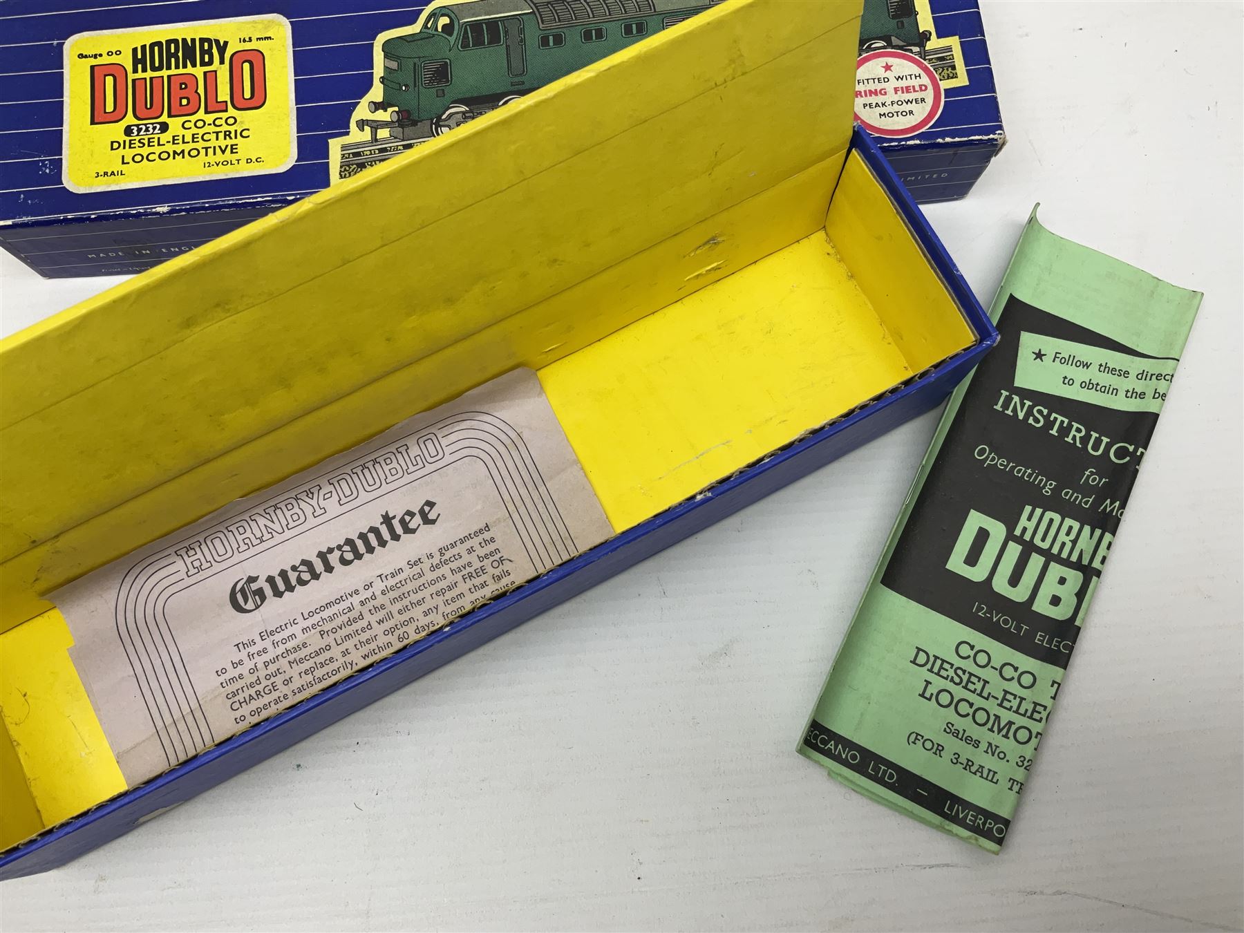 Hornby Dublo - three-rail - Deltic Type Diesel Co-Co locomotive with instructions and guarantee; and Class 20 1000 B.H.P. Bo-Bo Diesel Electric locomotive No.D8000; both in BR green; and each in original blue striped box (2)

