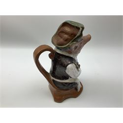 Royal Doulton character jug, Captain Hook D6947, together with majolica pig waiter pitcher, pitcher H23.5cm
