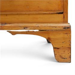 19th century waxed pine press cupboard, shaped cornice above a twin fielded panelled cupboard door enclosing a fixed shelf, the lower section two short two long drawer