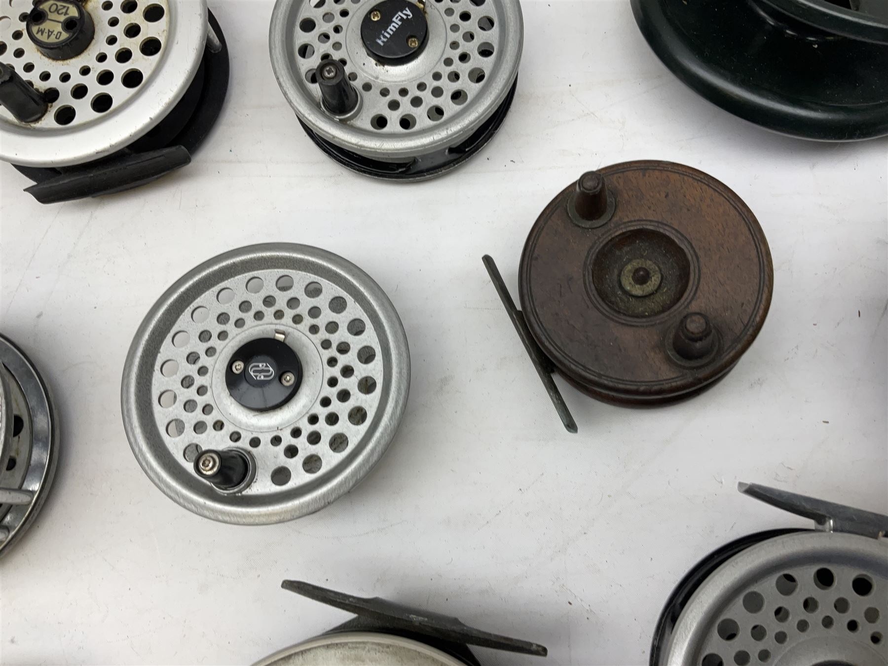 Fishing tackle, including 'The Gnat' fly reel, Alvey 4 1/2 inch reel, Paramount 4 1/2 inch reel, other fishing reels, various fishing flies and other similar items in a carry bag 