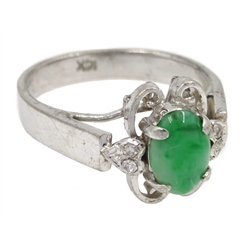 White gold cabochon oval jade and four stone diamond ring, stamped 14K  