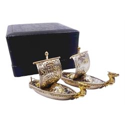 Pair of 20th century Japanese silver novelty cruets, modelled in the form of Viking long ships, marked Sterling Japan, contained within a fitted case, approximate silver weight 1.18 ozt (36.6 grams)