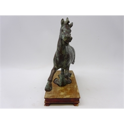  20th Century Chinese Tang Dynasty style bronze Flying Horse of Gansu, on hardwood base, L30cm x H27cm  