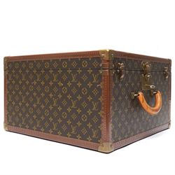 Mid-20th century Louis Vuitton monogram cabin trunk,  monogram canvas with lozine trim and brass mounts, single front leather handle with lock stamped Louis Vuitton with key code 1080701, the interior fitted with original webbing straps and lift-out tray, label to lid printed 'Avenue Marceau 78bis - Paris Nice - 2 Avenue de Suède' serial number 953998, circa1960s, with original key present
