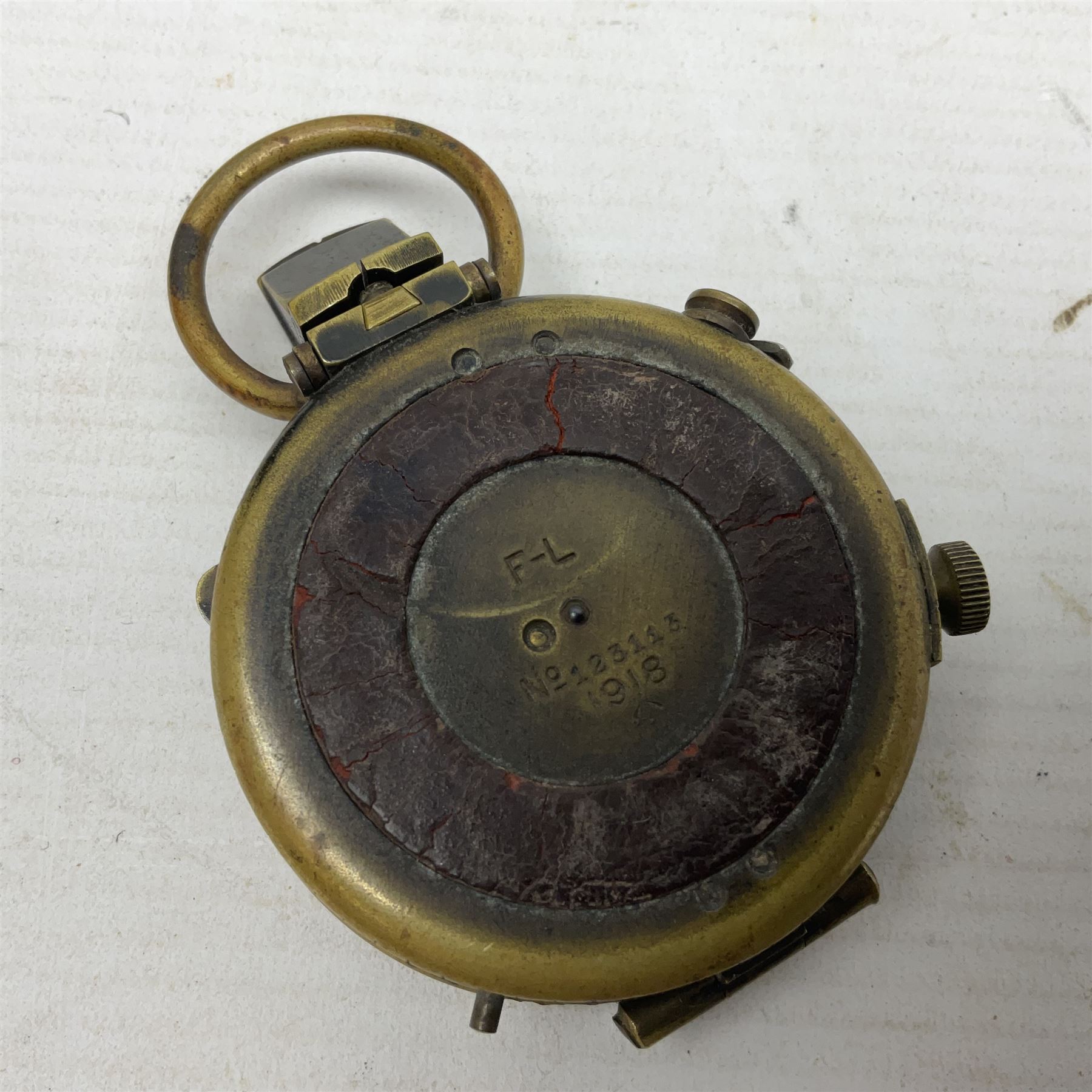 Broadhurst Clarkson brass and leather 4-draw telescope, the first draw with graduations, sliding lens shroud and leather covers for both ends on shoulder strap; marked 'Broadhurst Clarkson & Co. Ltd. 63 Farringdon Road London E.C.', L87cm fully extended; together with a WWI brass marching compass marked F-L No.123113 1918 (broad arrow); crudely etched L.H. McD. Latham; in associated Brooks & Co. leather case dated 1913 stamped W.B. Constable (2)
