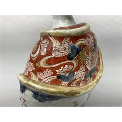 Large Japanese Imari porcelain figure, modelled as a Bijin, wearing a long kimono decorated with apple blossom and leafy branches on a white ground, with gilt detailing, possibly Edo period, H63cm