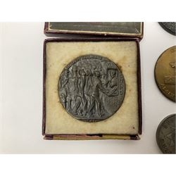 RMS Lusitania iron medallion dated 5th May, 5.5cm diameter, boxed with St Dunstan's Blinded Soldiers Profit paperwork; another unboxed similar Lusitania medallion; 30th Corps Alamein Cuxhaven medallion; Battle of Jutland 1916 silver memorial pendant; Navajo Code Talkers medallion 2000; and five other military related medallions