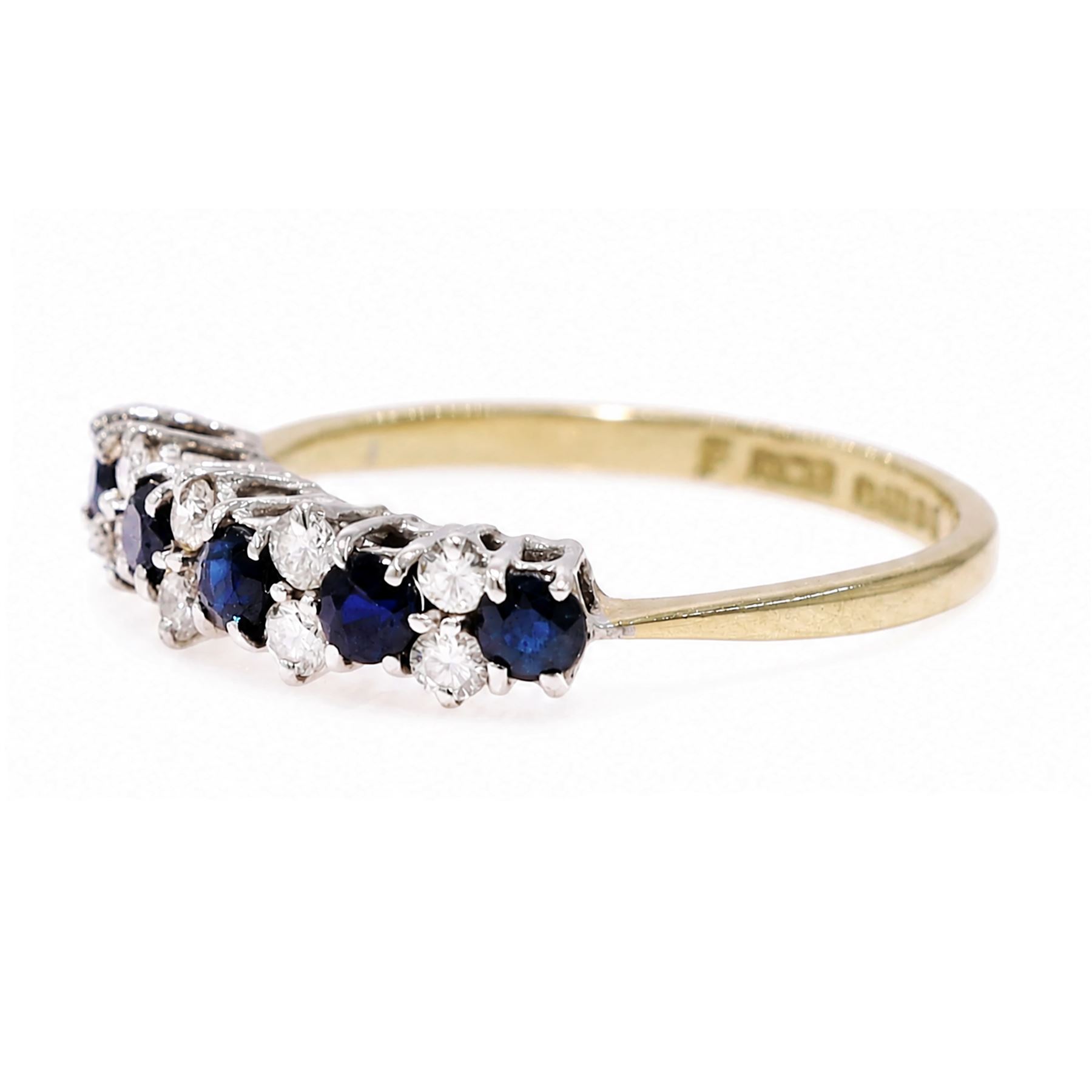 18ct gold sapphire and diamond ring, five round cut sapphires, spaced by two two round round brilliant cut diamonds, Birmingham 1983, total diamond weight approx 0.25 carat