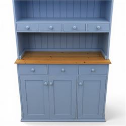Pine blue painted dresser, upper section with tongue and grove back, two shelves with three short drawers, above a base with soft close short drawers, and three cupboard doors, raised on a moulded plinth base