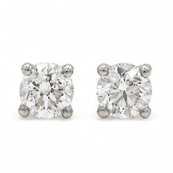 Pair of platinum diamond earrings, each stud set with a single round brilliant cut diamond, stamped PT 950total diamond weight approx 1.05 carat