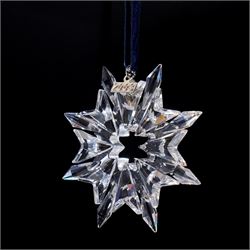 Nine Swarovski crystal snowflake Christmas ornaments, comprising years 1999-2005, 2010 and 2011, some with certificates, boxed (9)