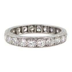 Early-mid 20th century platinum old cut diamond full eternity ring, twenty two diamonds of approx 0.06 carat, total diamond weight approx 1.30 carat, engraved decoration to the sides