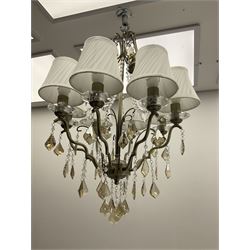 Eight branched chandelier with scrolling and beading decoration H73cm, with eight white pleated lampshades  
