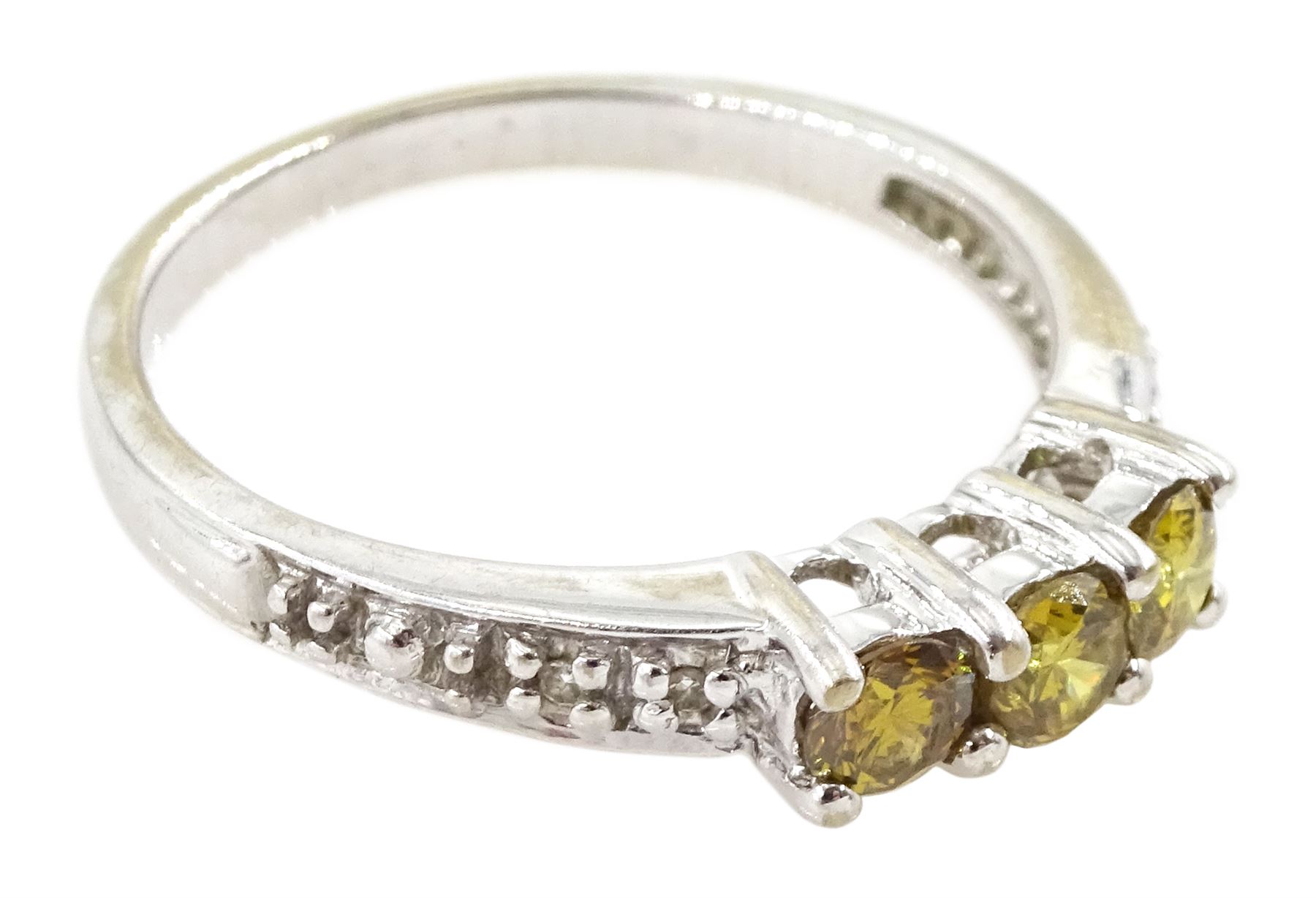 18ct white gold three stone fancy yellow diamond ring, with diamond set shoulders, hallmarked, total yellow diamond weight approx 0.40 carat