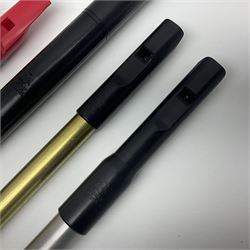 Three Tony Dixon Irish whistles comprising polymer low D, alloy low G and brass three-hole tabor low G; all in hard plastic issue cases with additional soft case for low D; and two other whistles by Generation (Bb) and Feadog (C) (5)