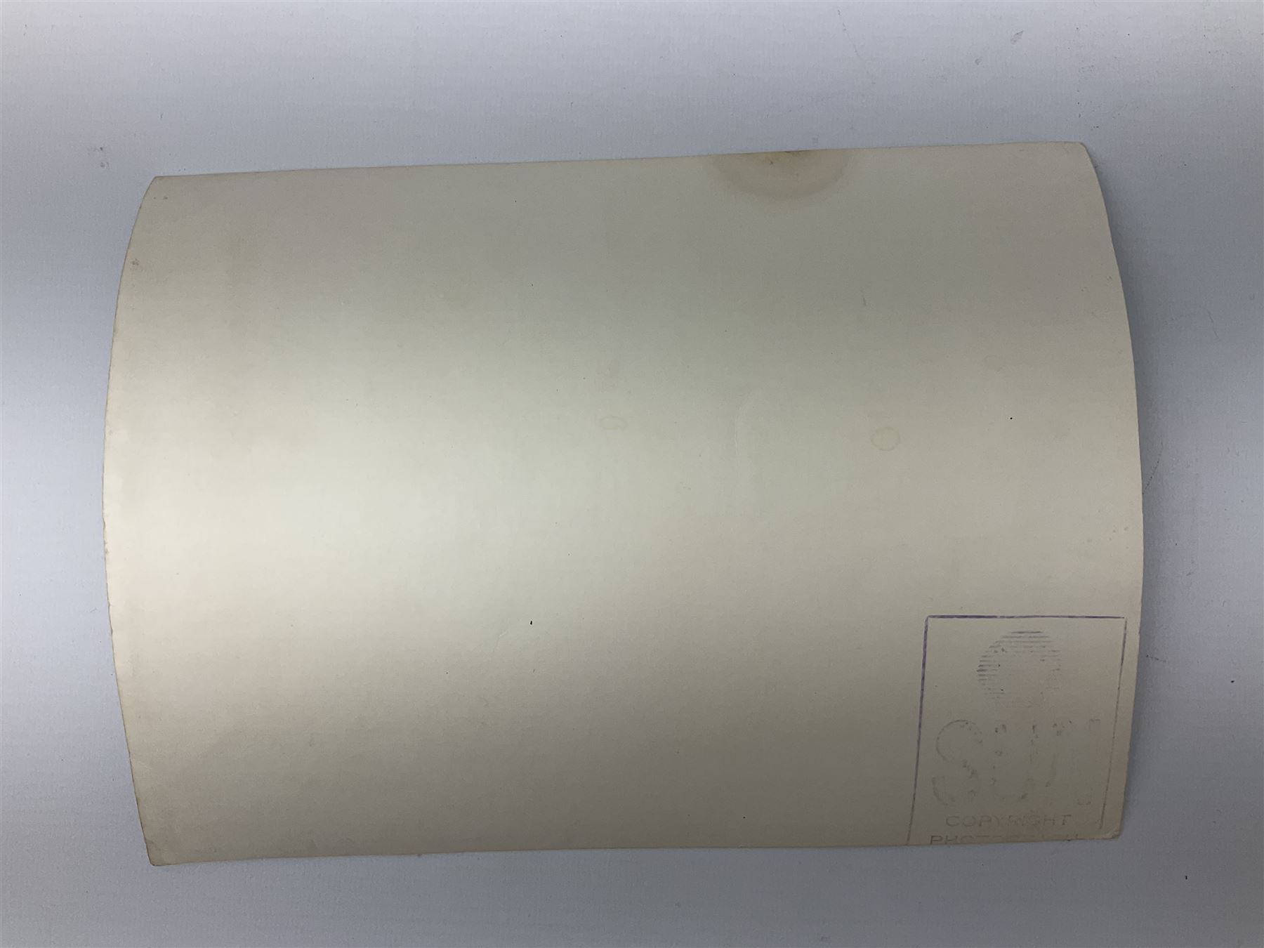 Early 1970s sepia photograph of the Pools Panel meeting at The Waldorf Hotel, London including Raich Carter, Marquis of Bath, Arthur Ellis, Neil Franklin etc 19 x 25cm; together with a beech spaghetti server with manuscript presentation inscription 'To Raich Carter from Henry 6th Marquis of Bath 1974'; Provenance: By direct descent from the family of Raich Carter having been consigned by his daughter Jane Carter (2)