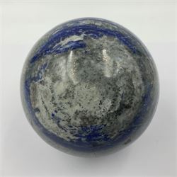 Lapis lazuli sphere, upon a carved stone stand, D10cn