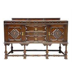 Early 20th century oak sideboard, fitted with two drawers and two cupboards, on turned supports joined by turned stretchers