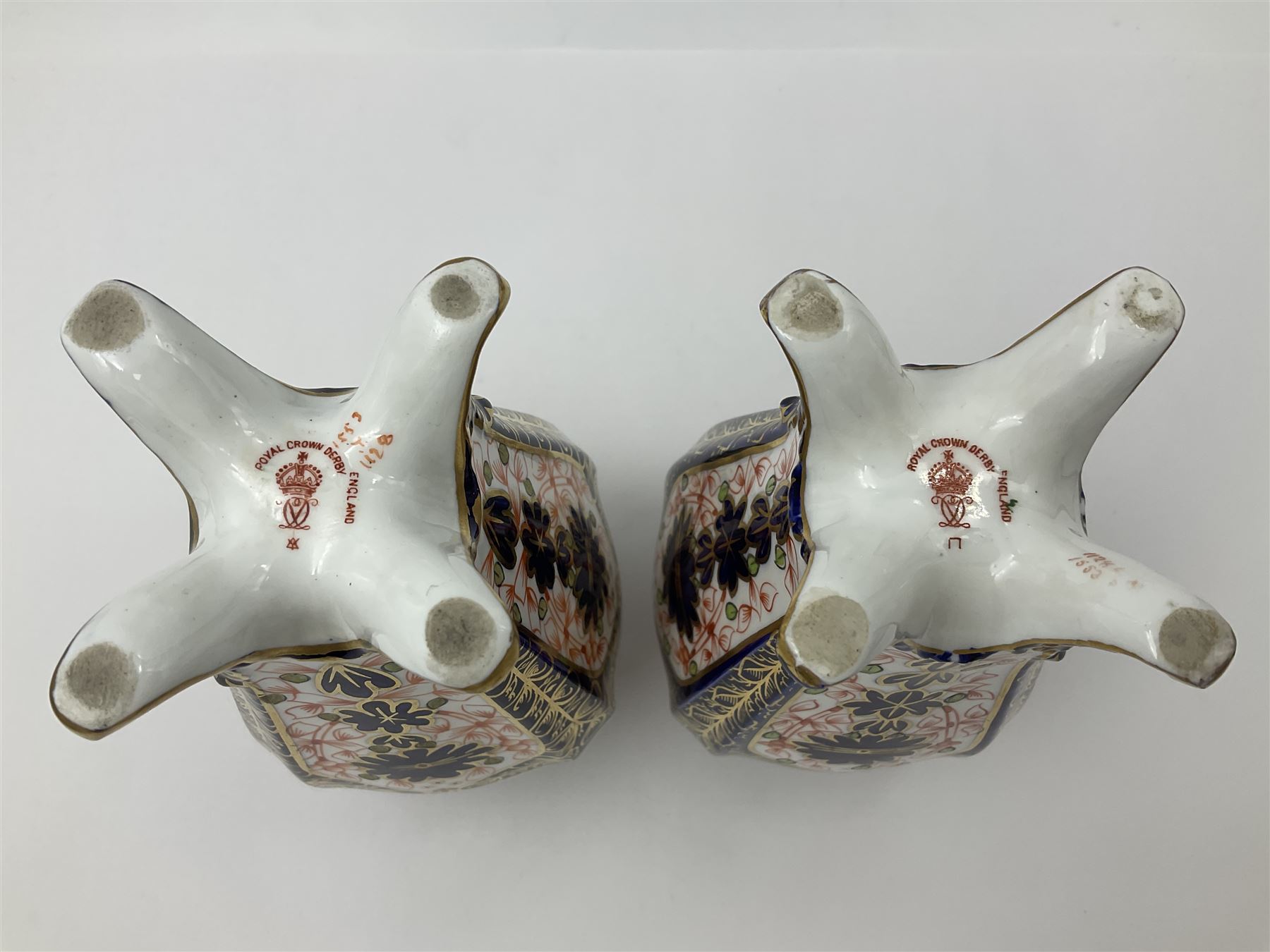 Pair of early 20th century Royal Crown Derby Imari 1128 pattern vases, of tapering straight sided form with waisted neck and frilled rim, upon four splayed feet, with printed and painted marks beneath including illustration date codes for 1911 and 1920, H17cm