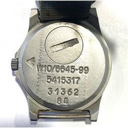 CWC Quartz British Military Army issue stainless steel gentleman's wristwatch, black enamel dial, with broad arrow, circled 'T' for Tritium and date aperture, back case stamped W10/6645-99 5415317 31362 84, on fabric strap