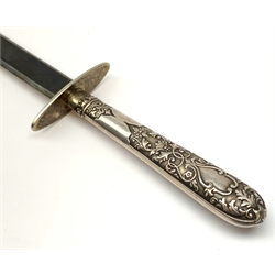 Knife with 15cm steel double edged flat blade, oval crosspiece and cutlery style plated scroll and foliate decorated handle with Victorian registration kite mark for March 1879, in stitched leather scabbard L26cm overall