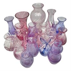 Collection of pink/purple Caithness glass vases, to include mottled and swirl designs, largest 20cm (19)