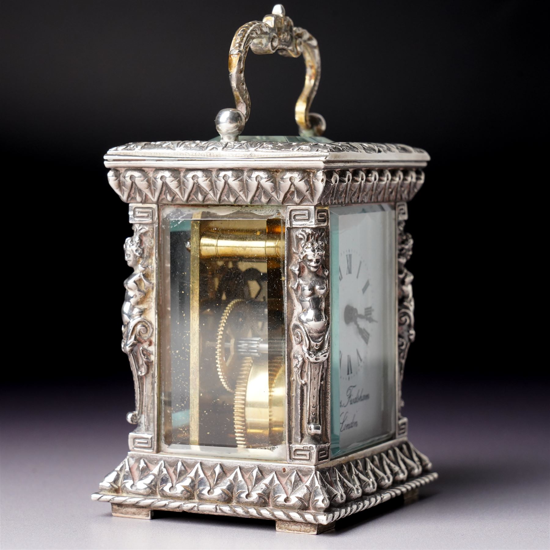 Chas Frodsham -  Miniature carriage clock with white dial and platform lever escapement in cast silver case with caryatid columns and bevelled glass panels H10cm  London assay No.0468