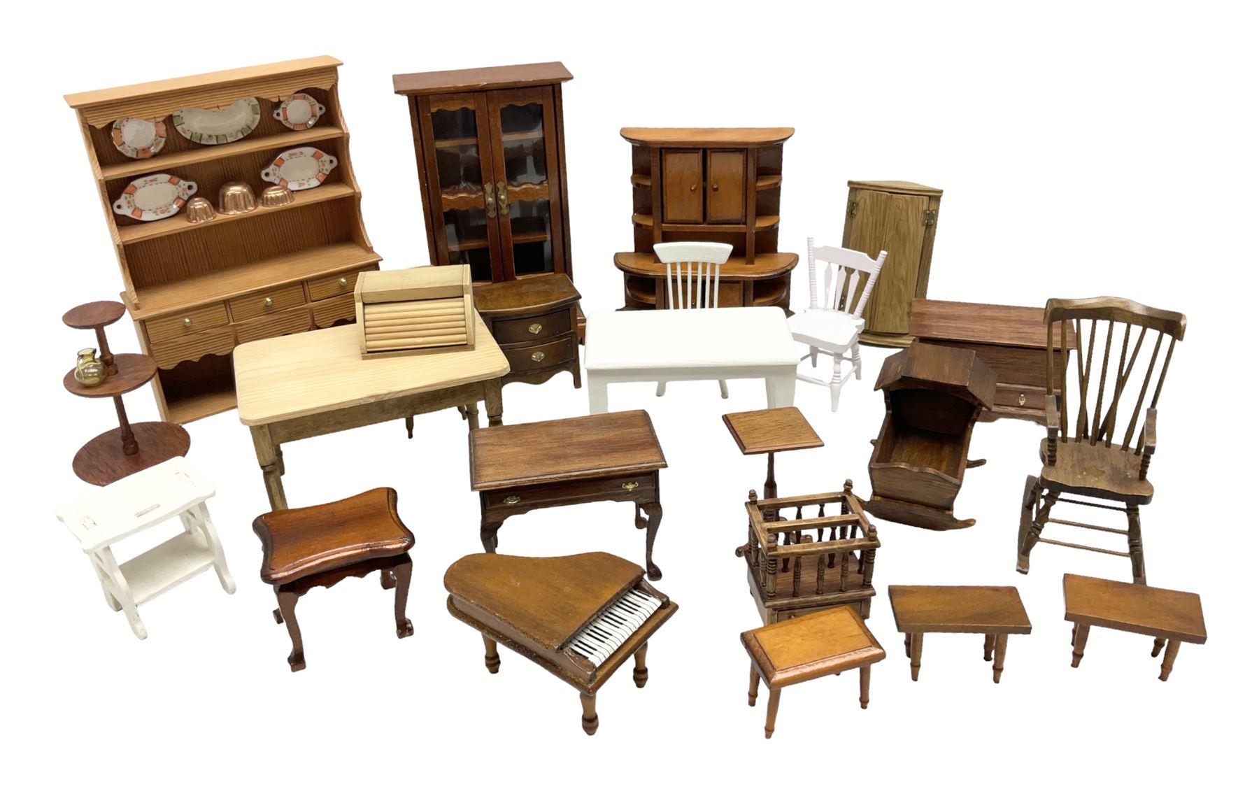 Doll's house wooden furniture - over twenty items including good quality pine Welsh dresser by Tony of Lincoln; tall 'glazed' bookcase; two-tier side cabinet; grand piano; bedside chest, mule chest, Canterbury; cradle; Georgian style hanging corner cupboard; dumb waiter; tables; chairs; rocking chair etc; various scales