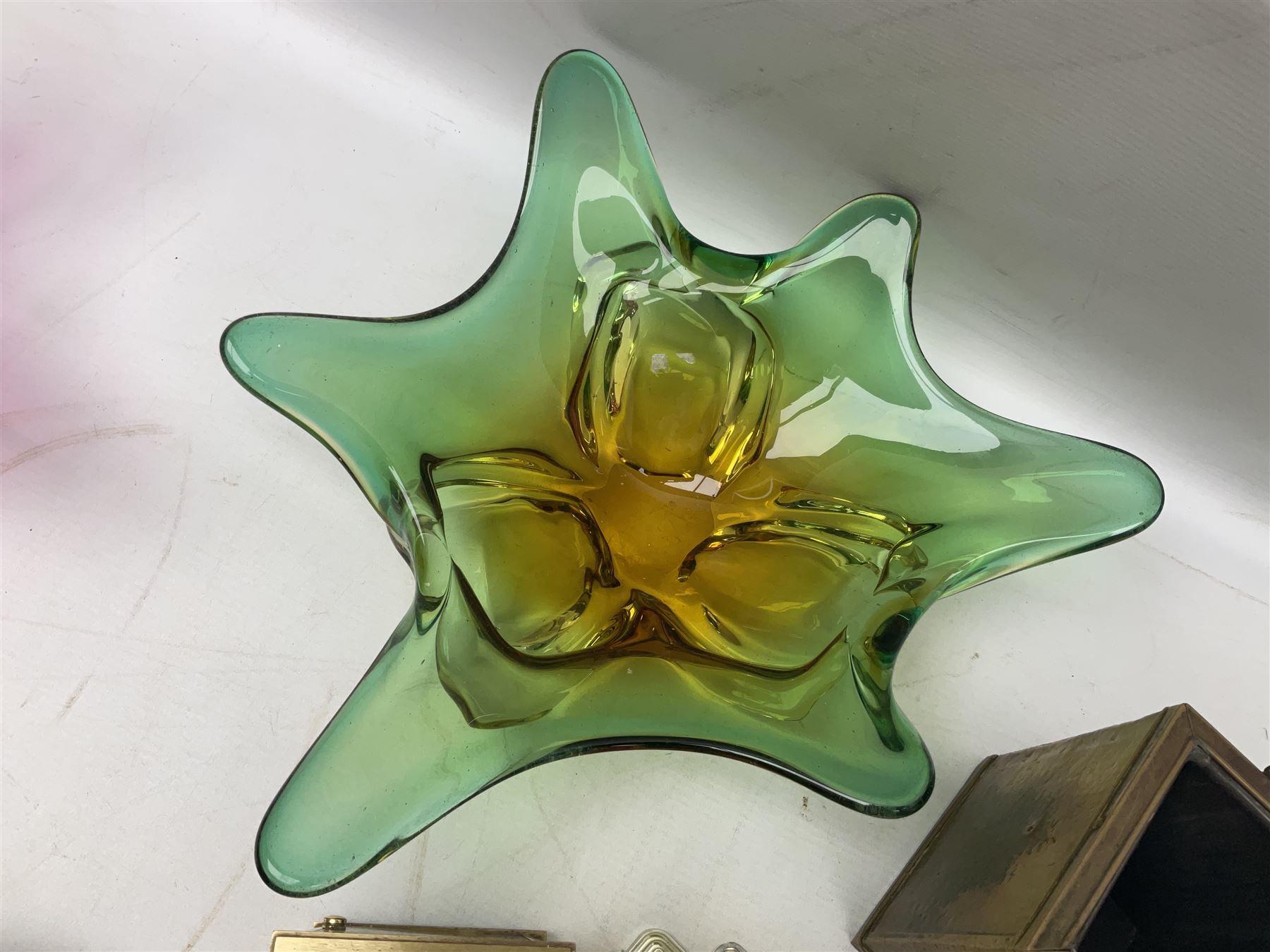 Metamec and H. Samuel battery operated brass carriage clocks, bronzed style abstract figure signed 'Cotp W', two art glass splash bowls, etc