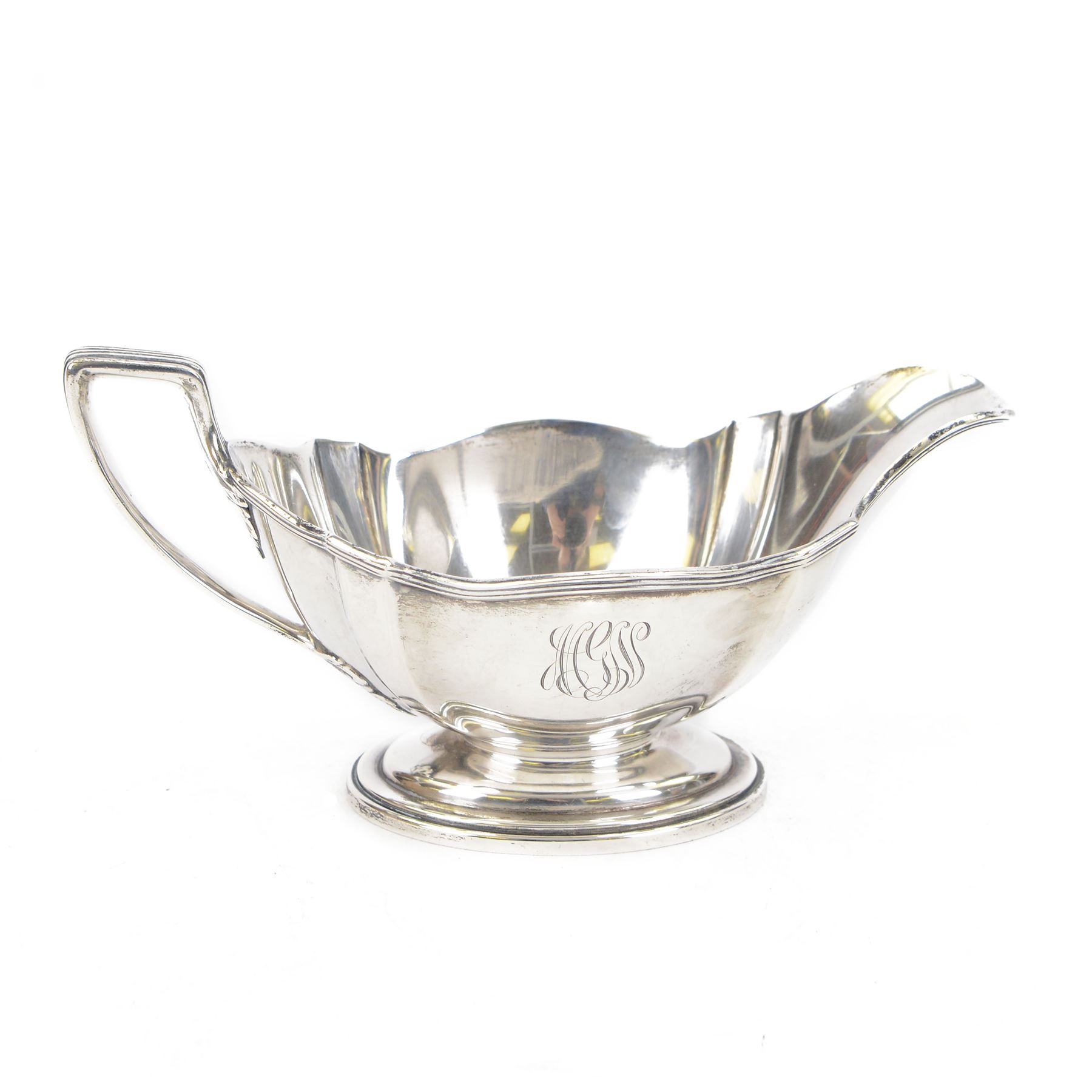 American silver sauce boat, with shaped rim and engraved to body with monogram, upon oval stepped foot, stamped Sterling and with maker's marks for Gorham, H9.5cm