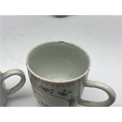 Two 18th century Chinese Yongzheng coffee cups, the first example decorated in polychrome enamel with rooster amidst blossoming peonies, the second decorated with deer and crane among rockwork and pine tree, together with two further 18th century Chinese coffee cups, an 18th century Chinese tea bowl, and a further tea bowl