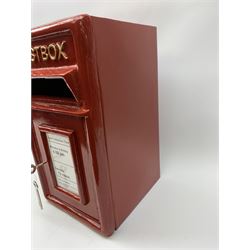 A reproduction red painted postbox, with keys, H43.5cm. 