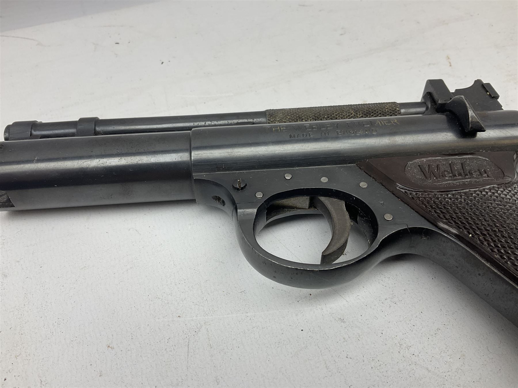 Webley Premier .22 air pistol with over lever action No.902 L24cm; and quantity of .22 pellets in two tins