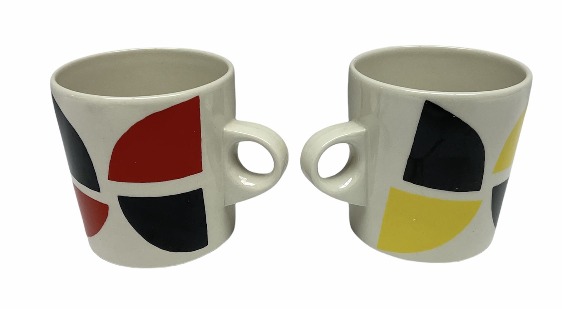 Sir Terry Frost (British 1915-2003): Two earthenware mugs, white glaze with geometric design, one yellow and black colourway, the other red and black colourway H8.3cm (2)
