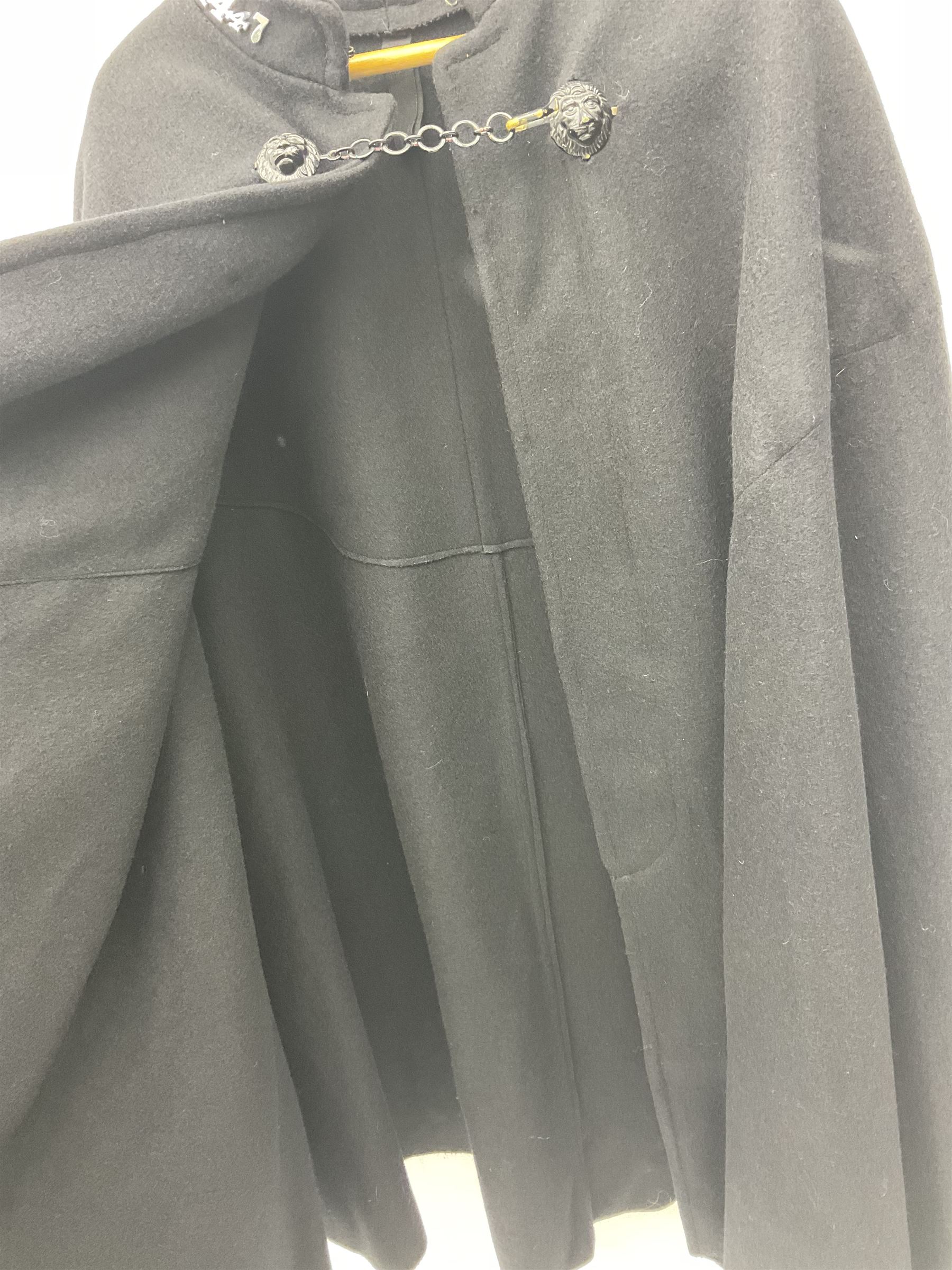 Police Constabulary style uniform items comprising woollen night cape / cloak with chain fastening, helmet and truncheon