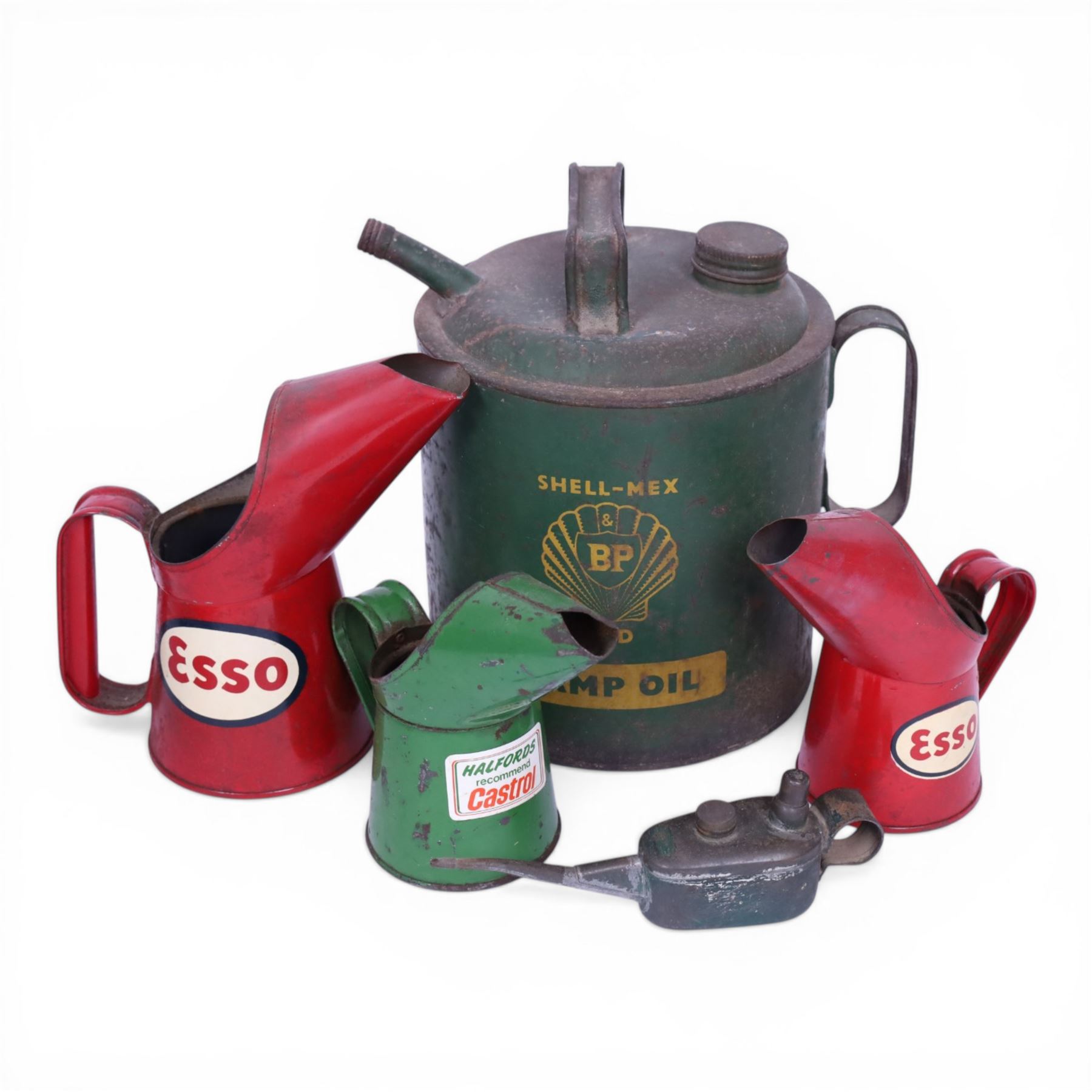 Shell-Mex Lamp Oil can, three oil jugs, including two red Esso examples and a green Castrol example and one other