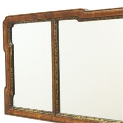 George III tripartite walnut overmantel mirror, shaped moulded frame with foliate carved gilded inner slip, enclosing an original mercury mirror plate, later applied back 