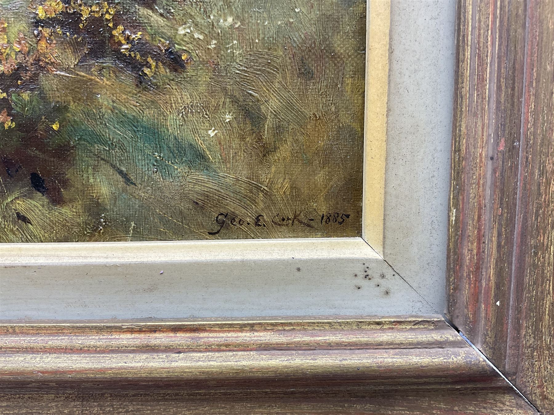 George Edward Cook (British 1844-1914): 'When the Gorse is out of Bloom, Kissing is out of Fashion - Runswick', oil on canvas signed and dated 1885, titled on the stretcher verso 20cm x 43cm