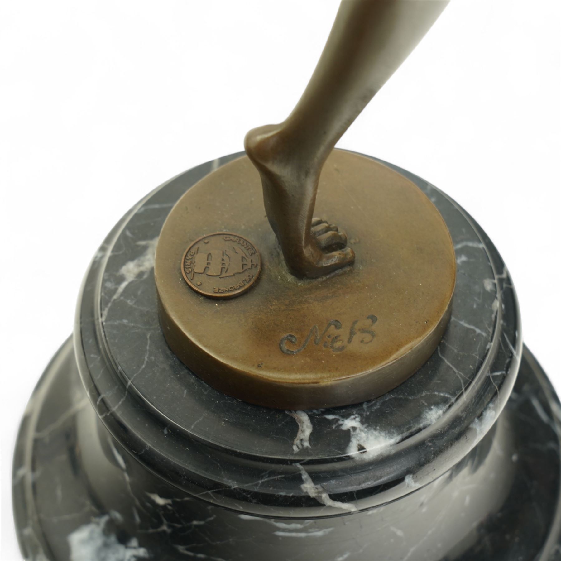 Art deco style bronze figure of a female dancing with flame torches, raised upon marble base, indistinctly signed, H43cm 