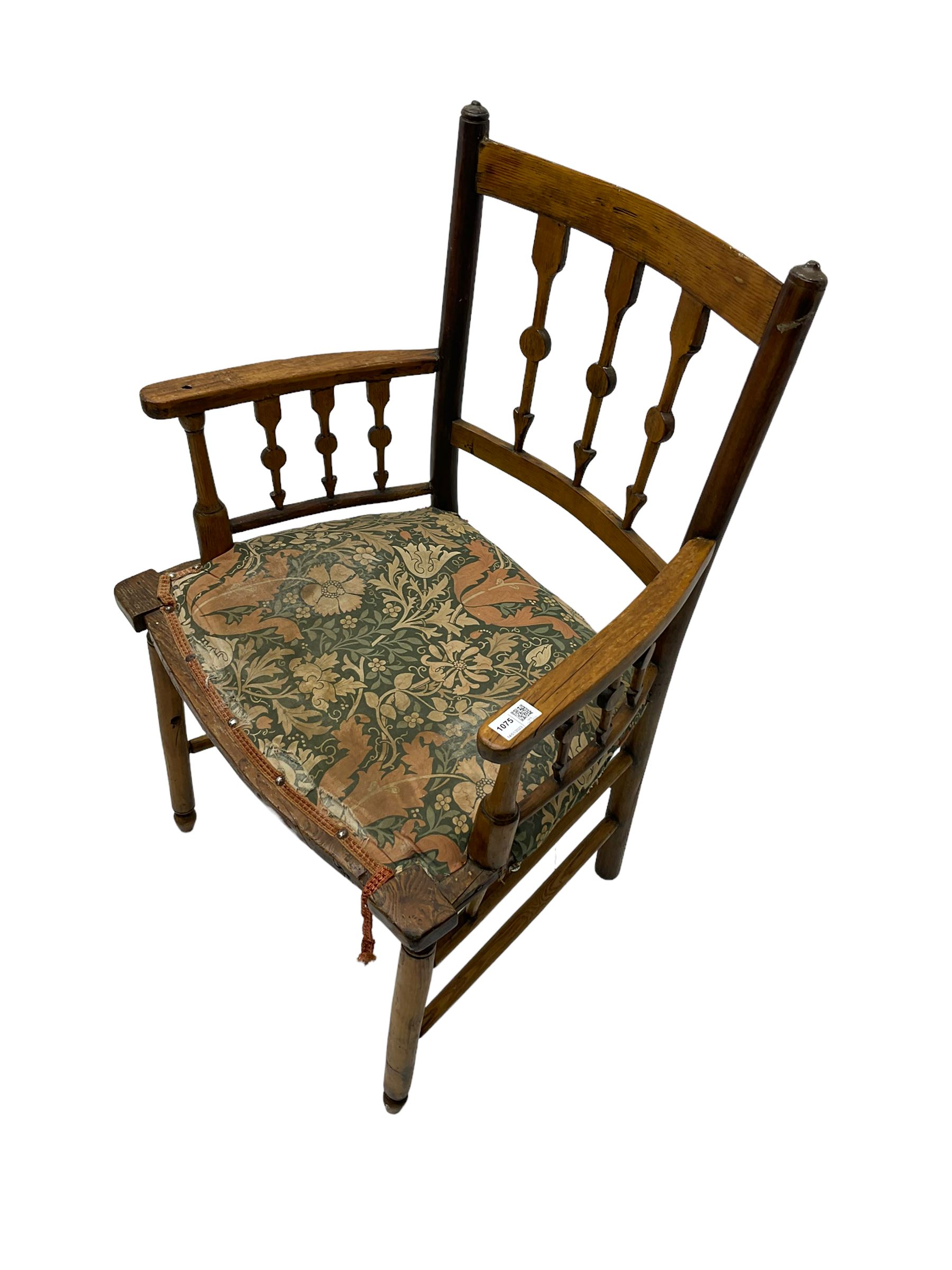 19th century ash and beech Sussex type elbow chair, the back and arms with arrow shaped vertical rails, upholstered seat, on turned supports