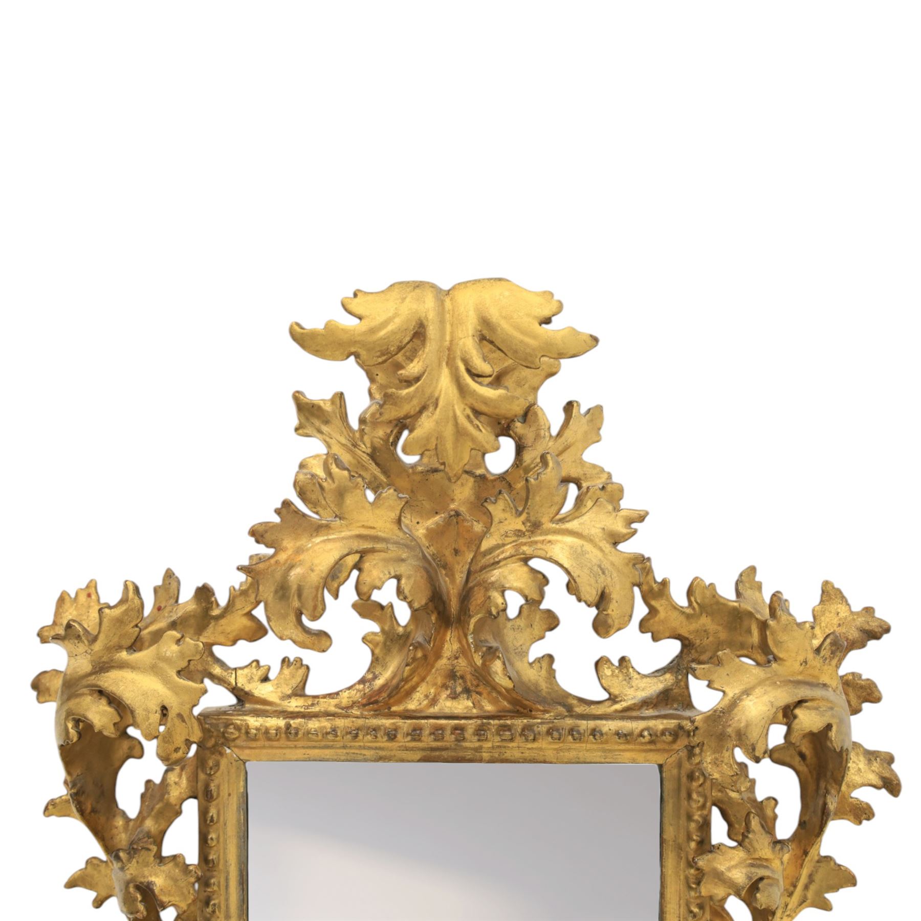 Finely carved Florentine giltwood mirror, acanthus design and egg and dart detailing, bevelled mirror plate 