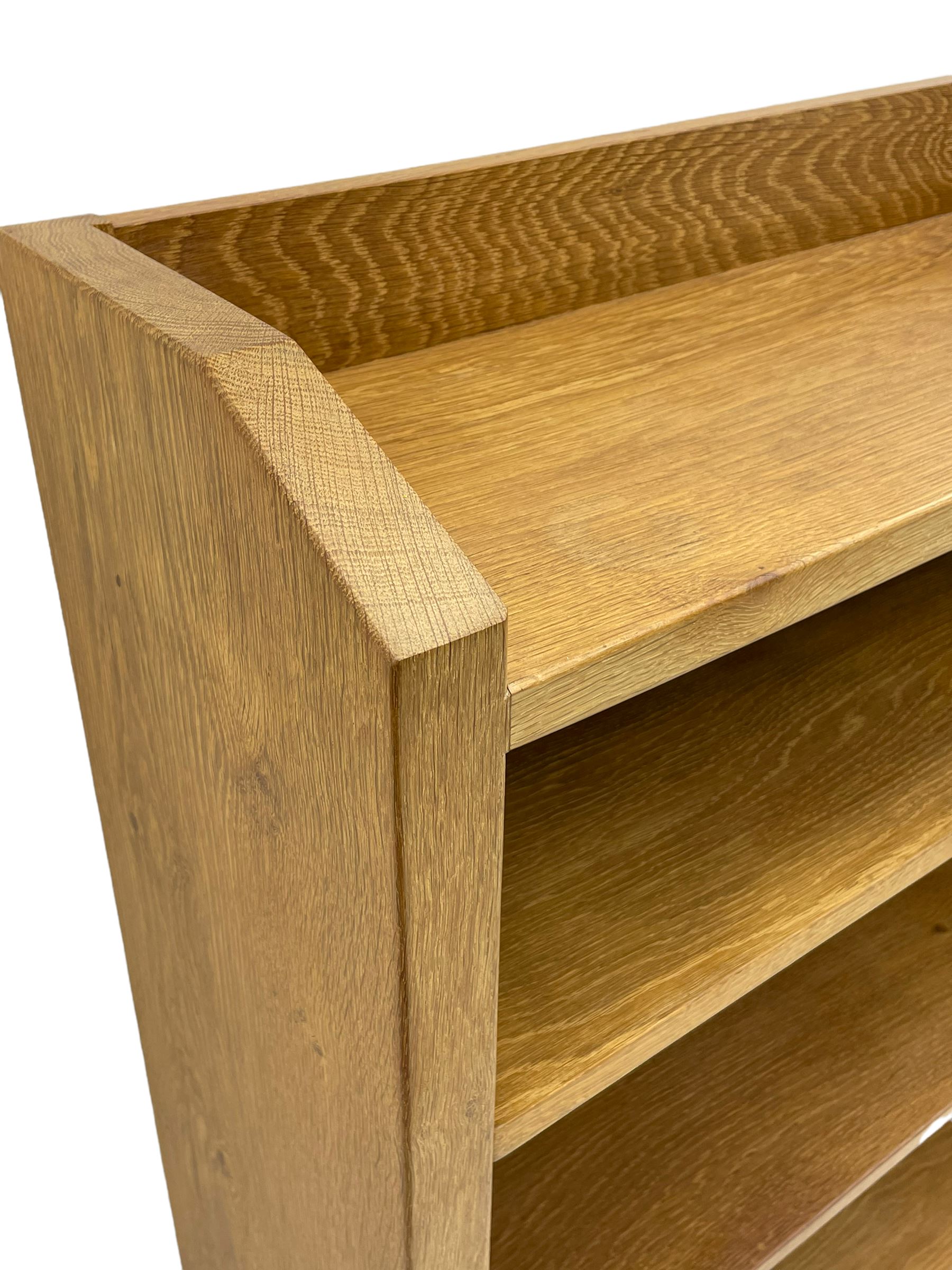 'Rabbitman' oak bookcase, fitted with three adjustable shelves, the top carved with rabbit signature, by Peter Heap of Wetwang