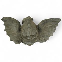 19th century cast lead fountain head with spout in the form of a grotesque fish, the mouth agape with rows of teeth, flanked by protruding fins 