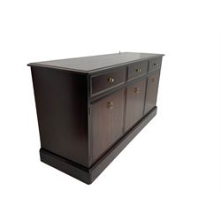 Stag Minstrel - mahogany sideboard, rectangular top over three drawers and three cupboards, on plinth base