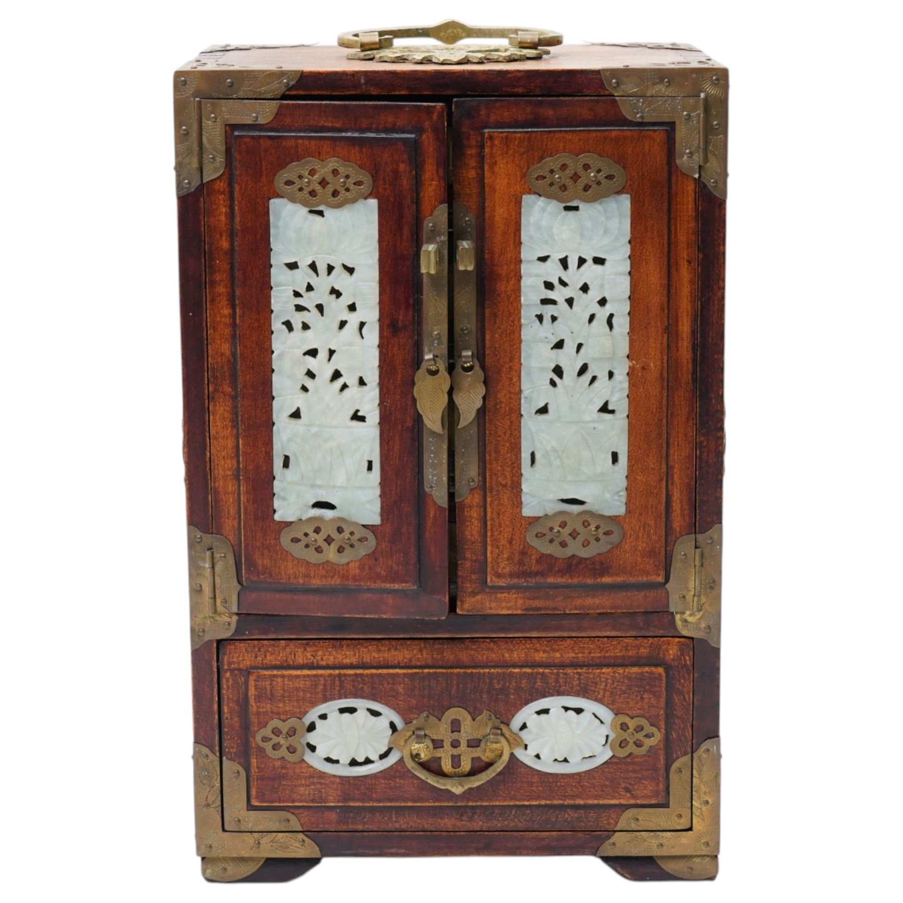 Chinese tabletop greenstone panelled cabinet, with brass mounts, feather pulls, revealing three fitted drawers, each with upholstered cushioned interior containing silver, polished stone and other costume jewellery