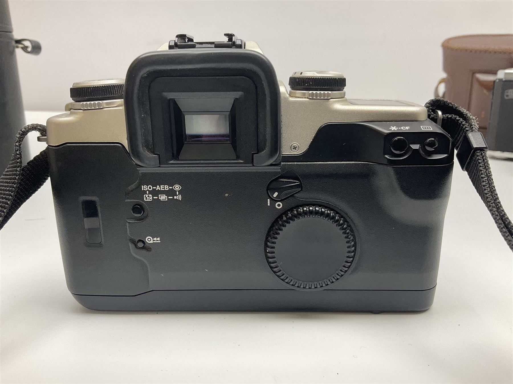 Canon EOS 50e camera body, serial no 8305671 with 'Canon Zoom EF 35-135mm 1:4-5.6' lens together with Halina 35X super camera body, with 'Halina Anastigmat f.c. 1:3.5 f=45mm' lens and other camera equipment 