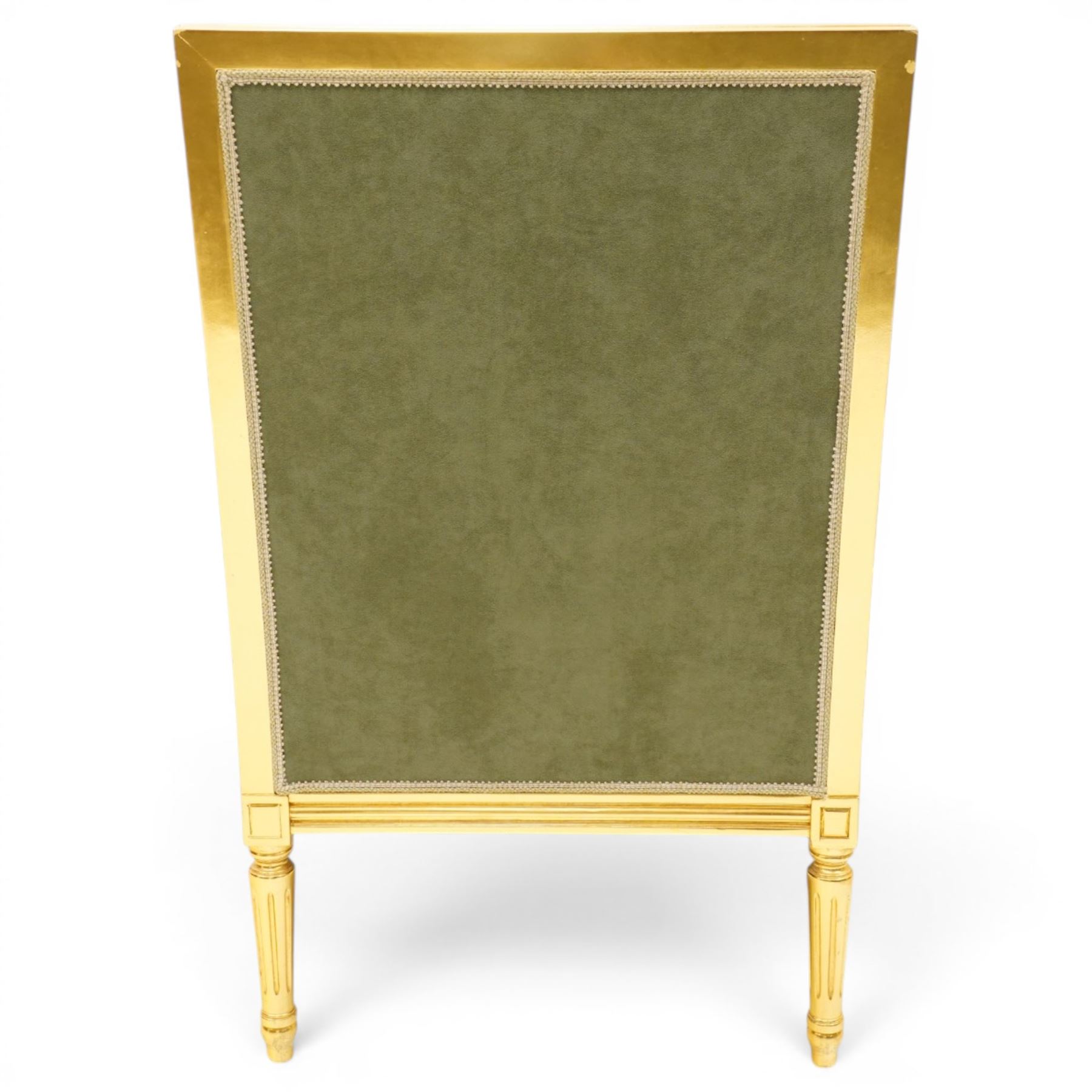Meritalia - French Empire design gilt framed armchair, the high back over scrolled arm terminals, reeded bottom rail over fluted tapering supports, upholstered in sage green and cream lozenge patterned suede fabric with loose seat cushion
Notes: By vendor's repute originally commissioned in the 1990s by Prince Jefri Bolkiah and the Brunei royal family for use in guest suites.