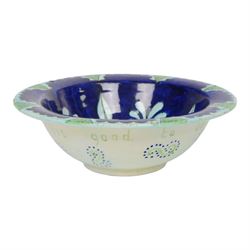 After Torquato Castellani, tin-glazed earthenware bowl, with a floral design the the centre, marked beneath, D19cm 