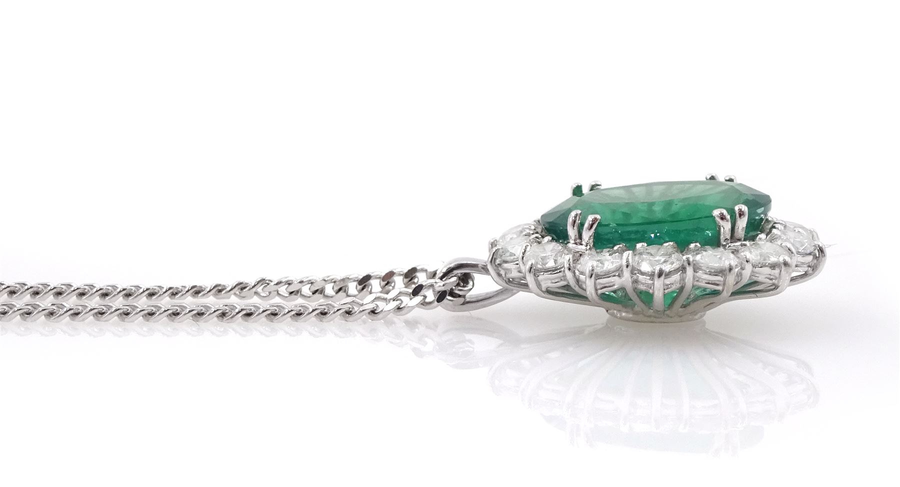 18ct white gold oval cut emerald and round brilliant cut diamond, cluster pendant necklace, hallmarked, emerald approx 4.00 carat