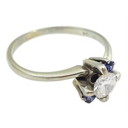 18ct white gold round brilliant cut diamond ring, set with a round sapphire either side, hallmarked, diamond approx 0.35 carat
